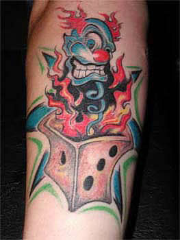 Clown in dice tattoo