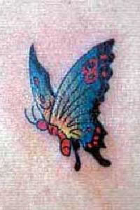 Small blue butterfly tattoo