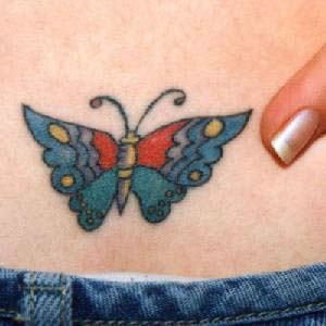 Stylized blue butterfly tattoo